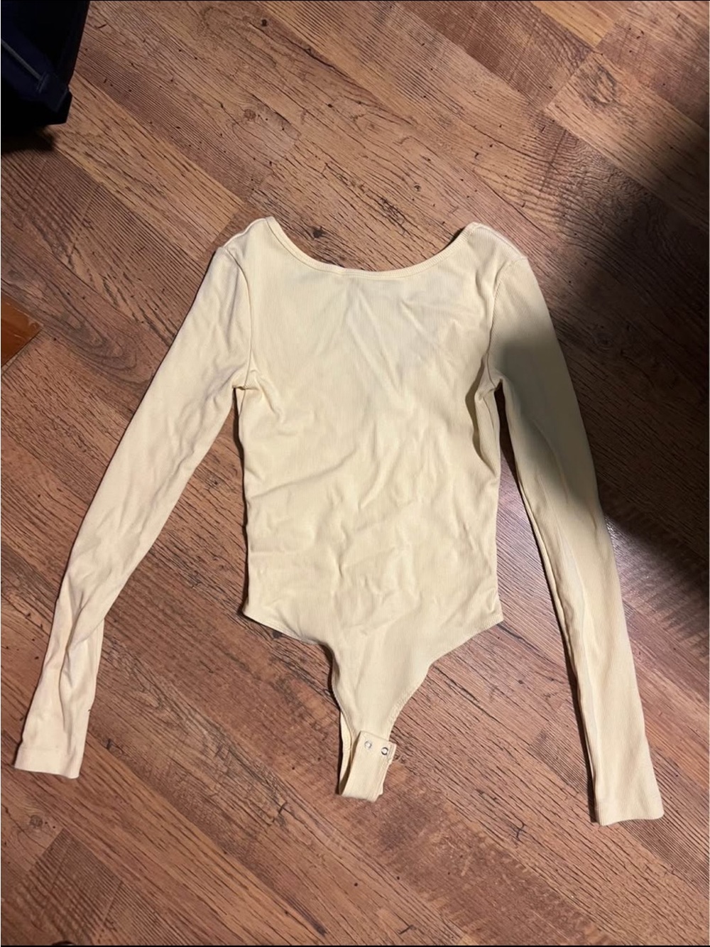 Long Sleeve One-Piece Bodysuit in Pale Yellow